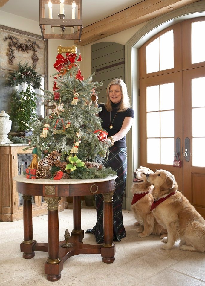 animal owner protecting christmas tree 